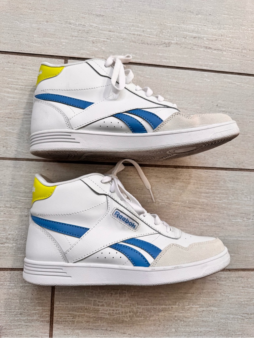 Reebok Women’s White & Blue High-Top Sneakers with Yellow Accent